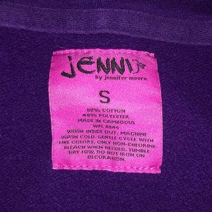 a purple zip up jacket